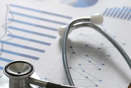 financial report chart and calculator Medical Report and stethoscope